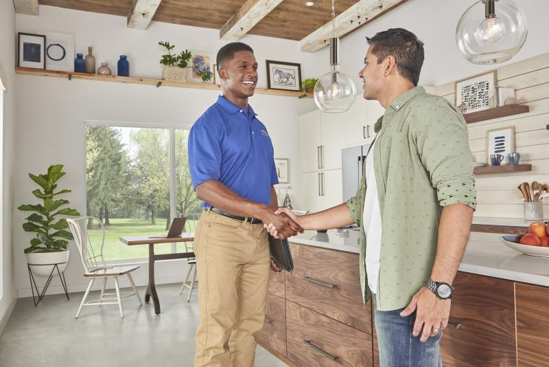 Dealer man handshake kitchen